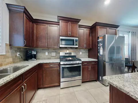 Kitchen - 9886 SW 99th Loop, Ocala, FL 34481 photo 10 of 11