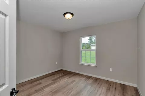Bedroom - 6961 SW 151st Loop, Ocala, FL 34473 photo 5 of 9