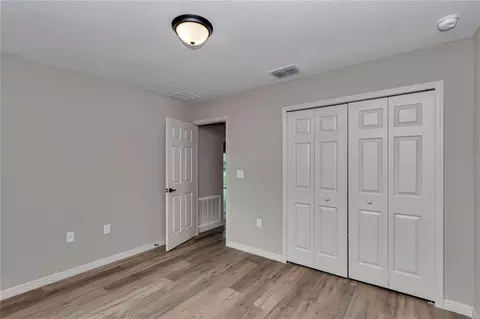 Bedroom - 6961 SW 151st Loop, Ocala, FL 34473 photo 7 of 9