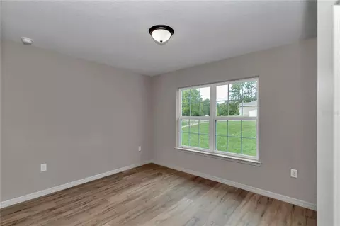 Bedroom - 6961 SW 151st Loop, Ocala, FL 34473 photo 6 of 9