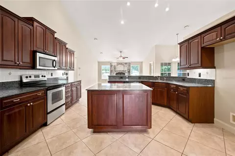Kitchen - 5259 SE 38th St, Ocala, FL 34480 photo 3 of 7