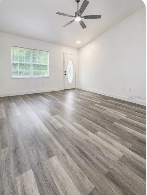 Living - 28 Locust Dr, Ocala, FL 34472 photo 2 of 4