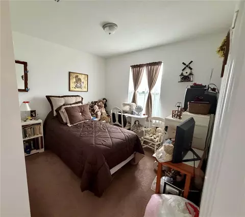 Bedroom - 16 Willow Run Dr, Ocala, FL 34472 photo 3 of 6