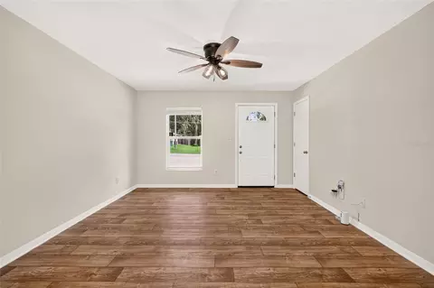 Living - 3174 SE 6th Pl, Ocala, FL 34471 photo 4 of 8
