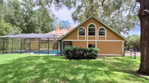 Exterior - 2210 SE Laurel Run Dr, Ocala, FL 34471 photo 7 of 11