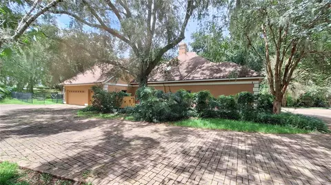 Exterior - 2210 SE Laurel Run Dr, Ocala, FL 34471 photo 4 of 11