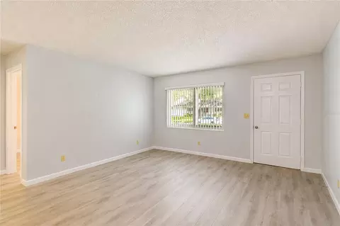 Living - 8702 SW 94th St #E, Ocala, FL 34481 photo 1 of 8