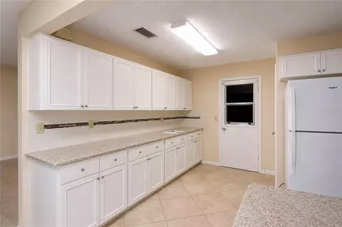 Kitchen - 8702 SW 94th St #E, Ocala, FL 34481 photo 6 of 6