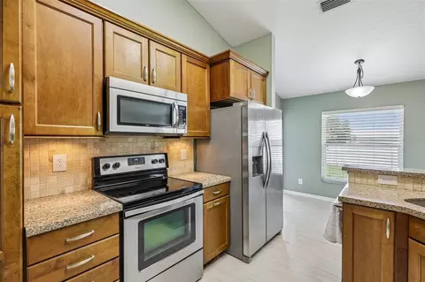 Kitchen - 5705 SW 89th Pl, Ocala, FL 34476 photo 2 of 5
