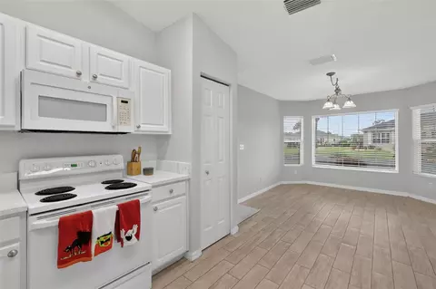 Kitchen - 8907 SE 141st Loop, Summerfield, FL 34491 photo 3 of 4
