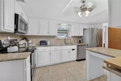 Kitchen - 5541 SE 22nd St, Ocala, FL 34480 photo 2 of 3