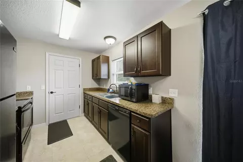 Kitchen - 157 Spruce Rd, Ocala, FL 34472 photo 1 of 2