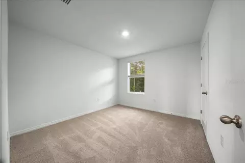 Bedroom - 745 SE 66th Ter, Ocala, FL 34472 photo 4 of 10