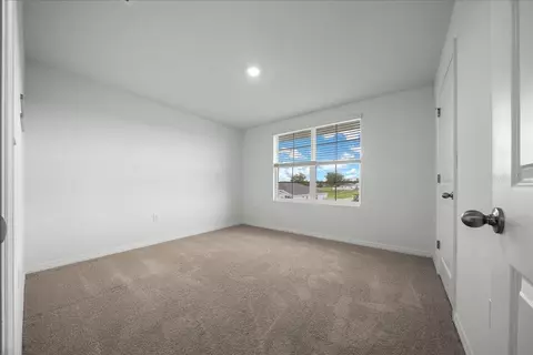 Bedroom - 745 SE 66th Ter, Ocala, FL 34472 photo 8 of 10