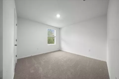Bedroom - 745 SE 66th Ter, Ocala, FL 34472 photo 7 of 10