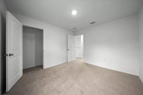 Bedroom - 745 SE 66th Ter, Ocala, FL 34472 photo 5 of 10
