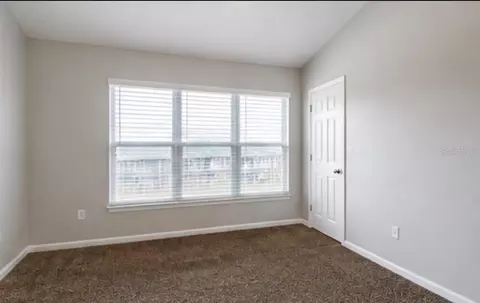 Bedroom - 4901 SW 45th St, Ocala, FL 34474 photo 8 of 9