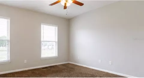 Bedroom - 4901 SW 45th St, Ocala, FL 34474 photo 9 of 9