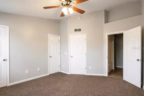 Bedroom - 4901 SW 45th St, Ocala, FL 34474 photo 1 of 9