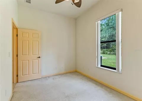 Bedroom - 10330 NW 28th Pl, Ocala, FL 34482 photo 6 of 7