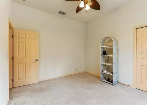 Bedroom - 10330 NW 28th Pl, Ocala, FL 34482 photo 2 of 7