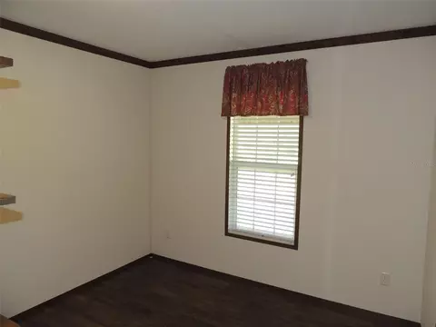 Bedroom - 5950 NE 107th Ct, Bronson, FL 32621 photo 6 of 6