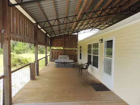 Exterior - 5950 NE 107th Ct, Bronson, FL 32621 photo 8 of 11