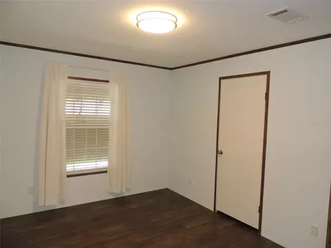 Bedroom - 5950 NE 107th Ct, Bronson, FL 32621 photo 4 of 6