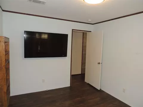 Bedroom - 5950 NE 107th Ct, Bronson, FL 32621 photo 5 of 6