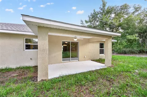 Exterior - 12 Hemlock Loop Trl, Ocala, FL 34472 photo 4 of 7