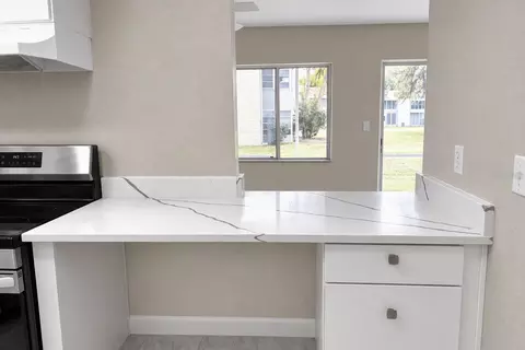 Kitchen - 627 Silver Pass #A, Ocala, FL 34472 photo 4 of 7