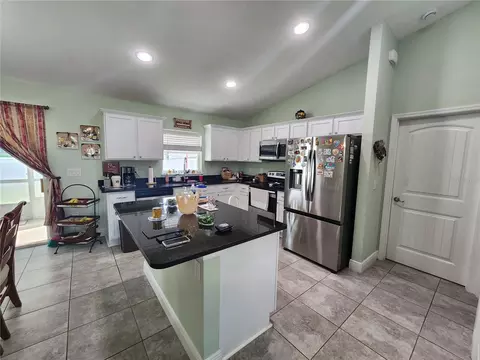 Kitchen - 24 Dogwood Drive Loop, Ocala, FL 34472 photo 2 of 2