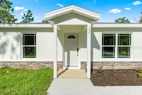 Exterior - 1570 NE 152nd Ct, Williston, FL 32696 photo 2 of 4