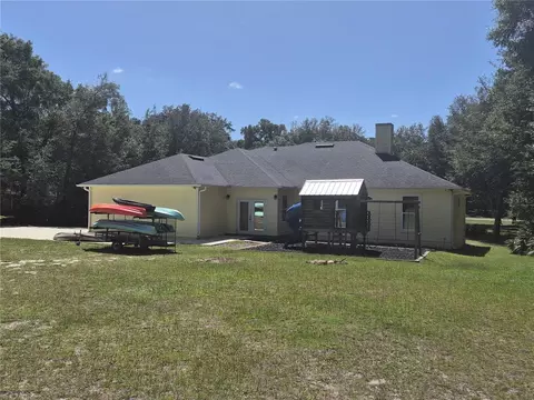 Exterior - 18216 SW 68th Loop, Dunnellon, FL 34432 photo 5 of 7