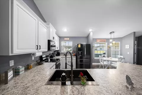 Kitchen - 4013 SE 98th Pl, Belleview, FL 34420 photo 1 of 6