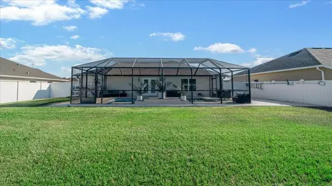 Exterior - 4013 SE 98th Pl, Belleview, FL 34420 photo 9 of 18