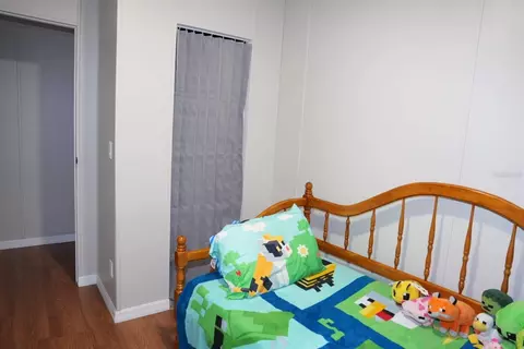 Bedroom - 12330 NE 77th Ct, Bronson, FL 32621 photo 5 of 6
