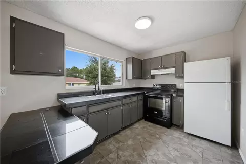 Kitchen - 24 Cedar Ter, Ocala, FL 34472 photo 1 of 2