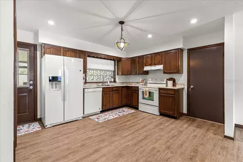 Kitchen - 5741 NE 4th Pl, Ocala, FL 34470 photo 2 of 3