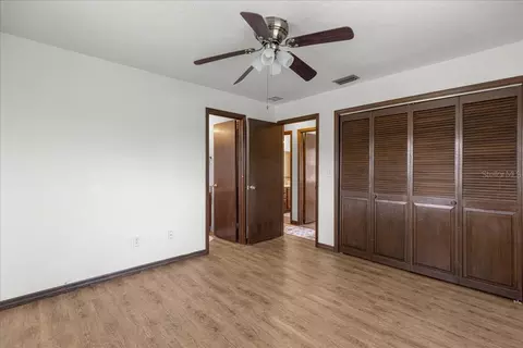 Bedroom - 5741 NE 4th Pl, Ocala, FL 34470 photo 5 of 6