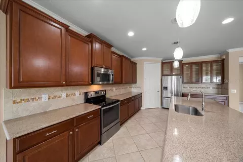 Kitchen - 9531 SW 70th Loop, Ocala, FL 34481 photo 2 of 3