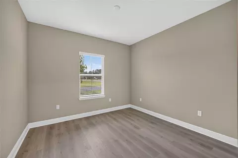 Bedroom - 10440 SW 106th Ct, Ocala, FL 34481 photo 2 of 3