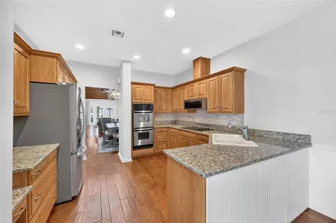 Kitchen - 1731 SE Clatter Bridge Rd, Ocala, FL 34471 photo 5 of 6