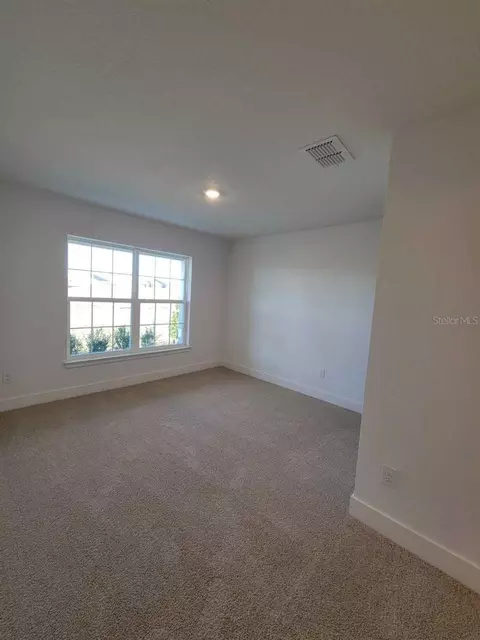 Bedroom - 4532 SW 90th Pl, Ocala, FL 34476 photo 2 of 4