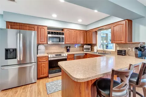 Kitchen - 8841 SW 93rd Pl #E, Ocala, FL 34481 photo 1 of 2
