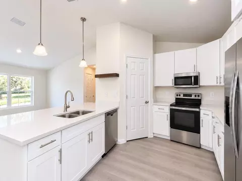 Kitchen - 442 NW 64th Pl, Ocala, FL 34475 photo 2 of 4