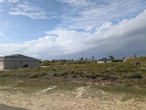 12 Poinciana Dr, Indian Lake Estates, FL 33855