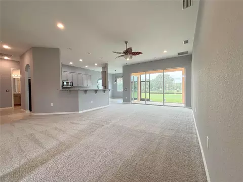 Living - 1124 Sawgrass Dr, Winter Haven, FL 33884 photo 1 of 5