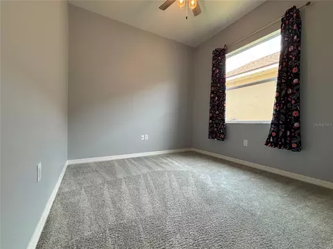 Bedroom - 1124 Sawgrass Dr, Winter Haven, FL 33884 photo 5 of 7