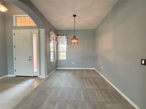 Living - 1124 Sawgrass Dr, Winter Haven, FL 33884 photo 4 of 5